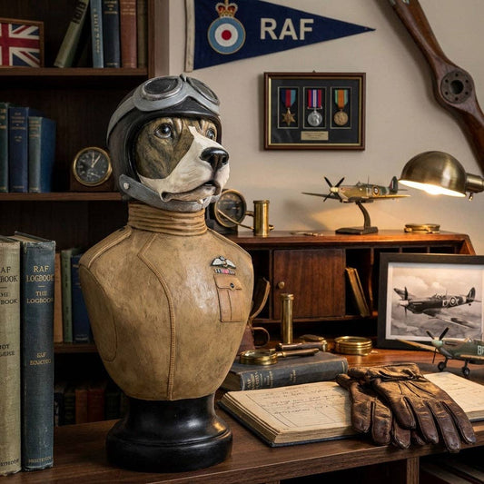 Dog statue in a pilot helmet on a desk with RAF memorabilia